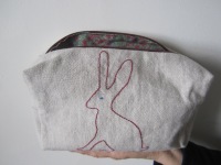 Embroidered hare on linen